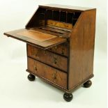 A fine oyster veneered walnut and crossbanded Bureau, of attractive small proportions, Queen Anne