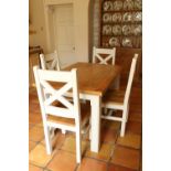 An oak and painted Kitchen Suite, comprising four heavy bracket type Chairs with X framed open