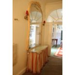 A Victorian painted wooden Overmantle Mirror, of wasted balloon shape, over a modern Shoe Rack,