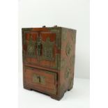 A late 19th Century / early 20th Century hardwood "Shanghai" Tobacco Table Cabinet, by Shanghai