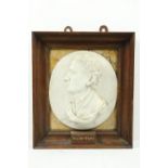 19th Century English School "Sir Isaac Newton," Carrera and Sienna marble, a side profile relief