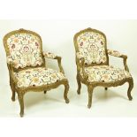 A good set of four matching 19th Century carved giltwood and gesso Fauteuils, each cartouche