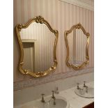 An attractive pair of gilt cartouche shaped Wall Mirrors, in scroll work frames, 43'' x 31'' (109cms