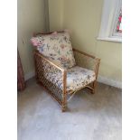 A three piece Suite of wicker work Seat Furniture, comprising a two seater Settee and a pair of