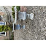A set of 4 heavy cast iron Garden Urns, each with egg and dart moulded folded rim and ribbed body on