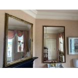 A modern gilt Wall Mirror, 54'' x 42'' (137cms x 106cms); and another modern Mirror, 63'' x 39'' (