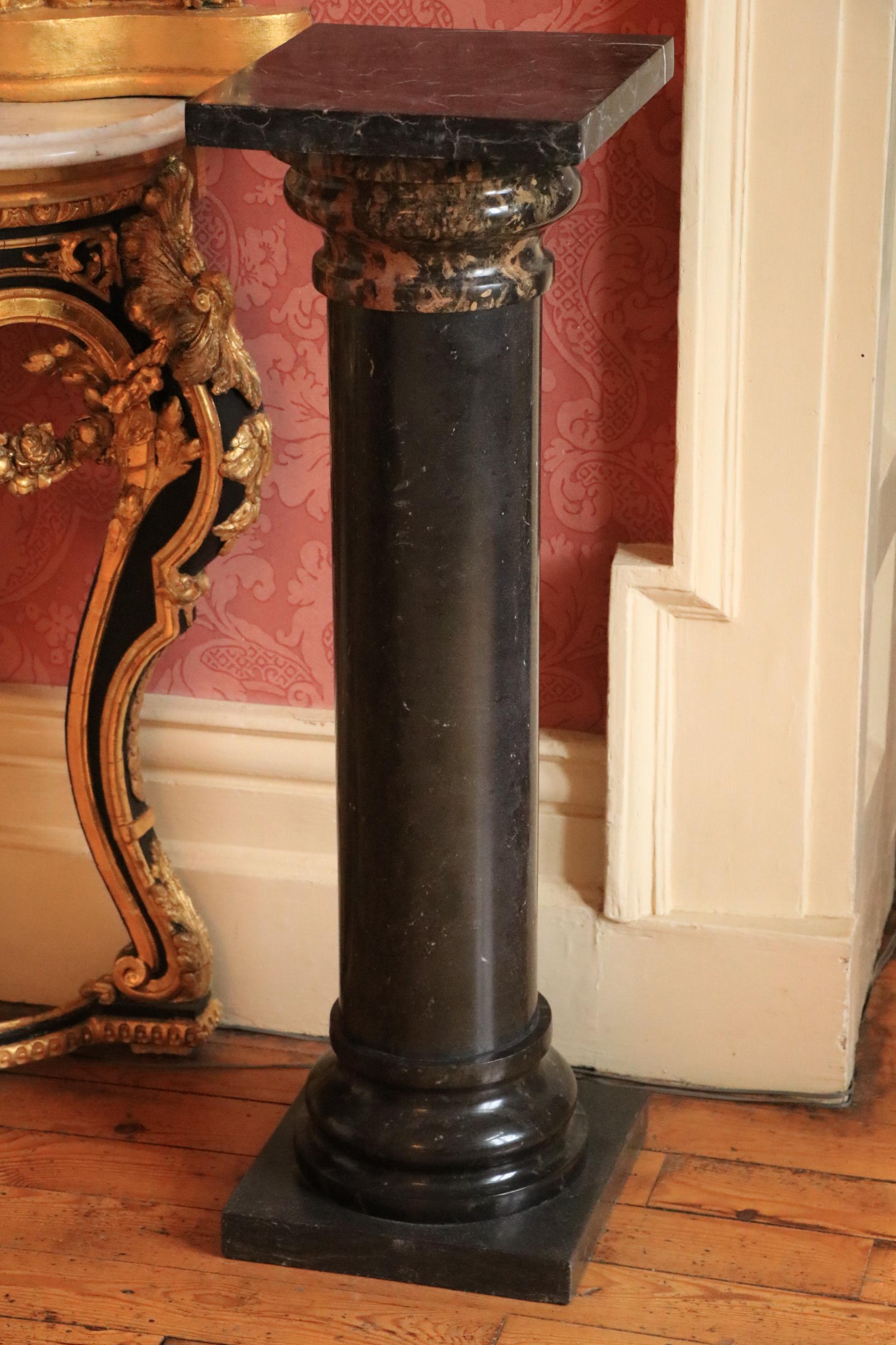 A two colour marble Plinth, with cylindrical column, square top and base, 36'' (91cms). (1)