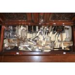 A large collection of various Newbridge Cutlery, including faux bone handled knives, plated forks,
