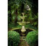 A very attractive three tier composition stone Fountain, each leaf moulded basin with several spouts