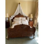 A 4'6'' French walnut cartouche shaped Bed, with bedspread, cushion and drapes. (1)