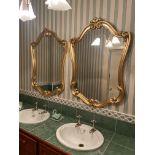 An attractive pair of gilt cartouche shaped Mirrors, in scroll work frames, 44'' x 31'' (109cms x