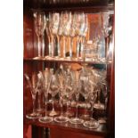 A set of 4 John Rocha Waterford crystal Wines, 6 Louise Kennedy Wine Flutes, a pair of John Rocha