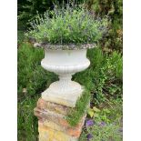 A pair of moulded composition Garden Urns, each with a moulded edge on a half reeded body on