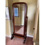 A Victorian style walnut Cheval Dressing Mirror, with internal storage on shaped supports and with