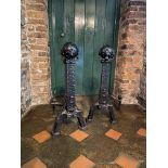 A pair of heavy Gothic Revival cast iron Andirons, each with ball finial on arched front legs,