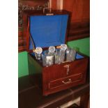 An attractive modern mahogany cased Box Tantalus, with matching set of three Waterford cutglass