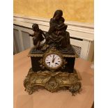 ﻿A French gilt metal mounted and polished black marble Mantle Clock,﻿