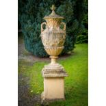 A massive pair of terracotta coloured composition stone Garden Urns, Covers and Plinths, 7' 6'' x