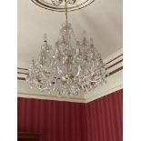 A late 18th Century / early 19th Century "Waterford" two tier twenty-four branch glass Chandelier,