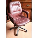 A modern swivel Office Chair, covered in red hide. (1)