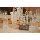 A Waterford crystal Vase, 10'' (25cms), together with two similar square glass Decanters and a