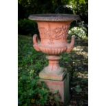 A very good pair of compona shaped terracotta Garden Urns, each with egg and dart folded rim above a