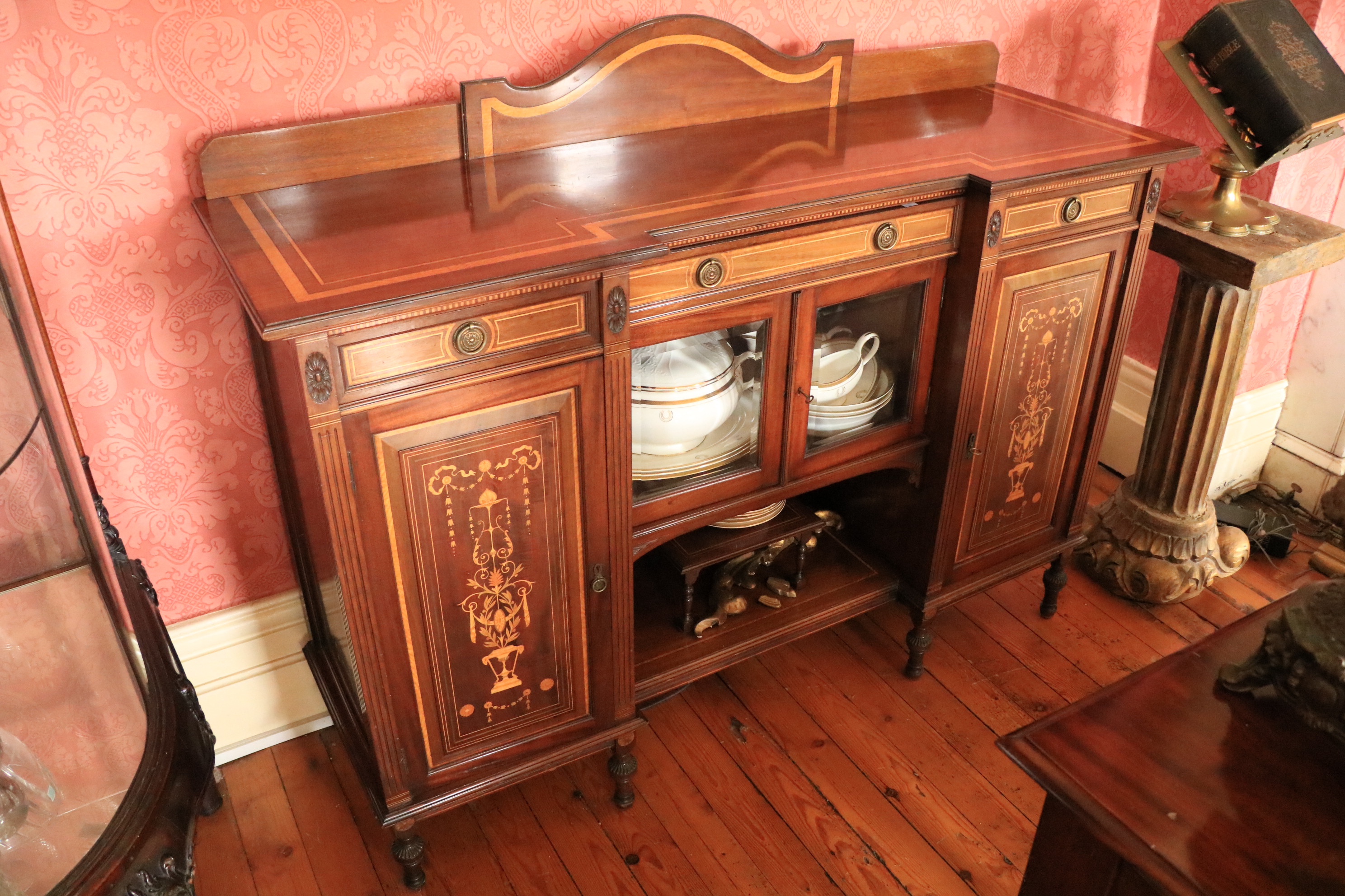 An Edwardian marquetry inlaid and satinwood banded mahogany Side Cabinet, of inverted breakfront