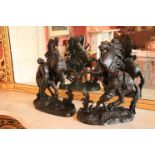 After G. Coustov A pair of bronzed Spelter Marley Horse Groups, showing a pair of rearing horses