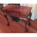 A Chippendale style fold-over mahogany Games Table, for backgammon, chess and draughts, with