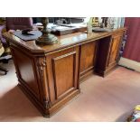 A good Georgian style mahogany kneehole pedestal Desk, the rectangular top with canted corners and