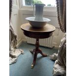 A circular Regency style mahogany rosewood banded Occasional Drum Table, on tripod base, 24'' (