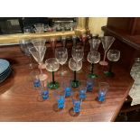 Eight similar Shot Glasses; and a miscellaneous collection of coloured Glasses. (a lot)