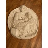 An attractive plaster cast medallion shaped Plaque, depicting Madonna & Child, approx. 35" (89cms)