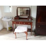 An Edwardian inlaid and crossbanded mahogany Dressing Table, with swing frame mirror and four