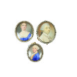An 18th Century oval Miniature Portrait, of a Gentleman wearing a grey powdered wig and blue gilt