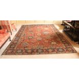 A magnificent Persian polychrome semi-antique Carpet,ÿthe red ground profusely decorated with images