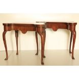 A fine pair of 18th Century red walnut fold-over Card Tables, probably Irish, each with front