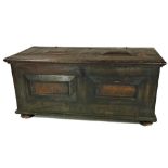 A large late 18th Century Continental stained pine Coffer, with panelled top and front, with heavy