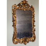 A fine quality early George III (possibly Irish) period carved giltwood Wall Mirror, decorated