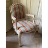 A French style painted beech Fauteuil, covered in candy stripe fabric on front cabriole legs. (1)