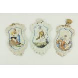A set of 3 Spanish white enamelled earthenware Wall Plaques by Alcora Factory, c. 1755, the