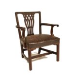 An early Georgian period mahogany framed Carver Armchair,ÿthe square back with pierced decorated