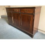 A modern inlaid mahogany Side Cupboard, with three frieze drawers and three cupboard doors on