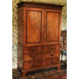 A good quality George III crossbanded Gentleman's Linen Cupboard,ÿwith dentil moulded Arcadian and