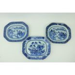 A pair of Nankin blue and white Meat Platters, decorated with figures and residents by a lake;