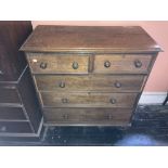 An early Victorian oak Chest, with three long and two short drawers, on turned legs, 45"h x 42"w (