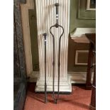 A large early heavy cast iron Fire Tongs, with knop finial and baluster shanks, approx. 45" (115cms)