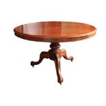 A circular Victorian walnut Breakfast Table, with moulded top on tripod base, 46" (117cms). (1)