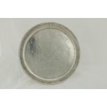 A Victorian silver circular Presentation Salver, London 1885, with reeded border and bead edge on