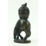 A very unusual Chinese bronze Censor, the pierced ball shaped top with piercedÿ cover surmounted